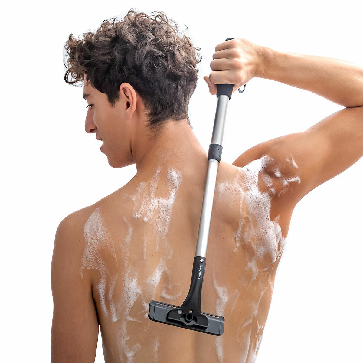 Rasoir pour le corps avec manche extensible en aluminium pour atteindre les zones difficiles.